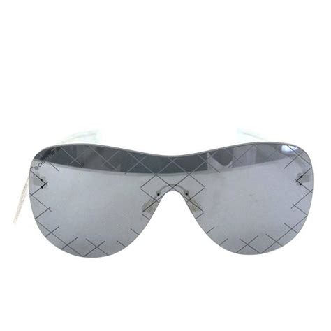 chanel eyewear silver & grey shield mirror|who manufactures Chanel eyewear.